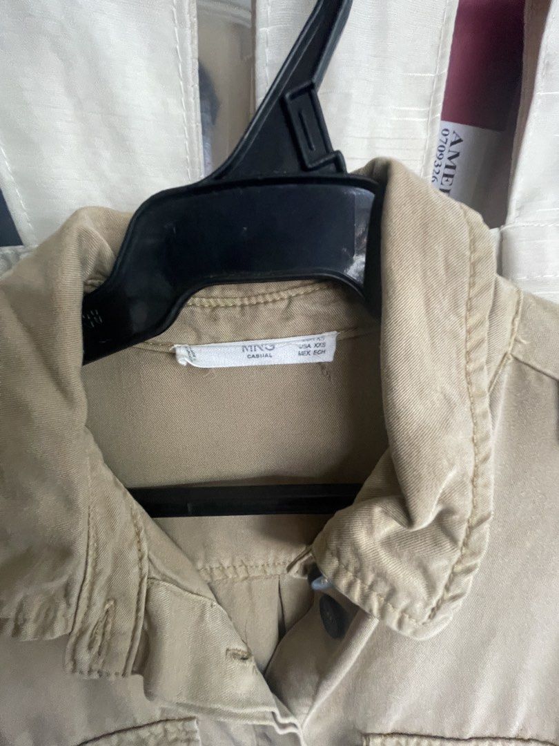Mango Khaki Utility Romper Jumpsuit (Category: Rompers) located in Mandaluyong City. Submitted by coolmeybab (Listing ID 1461006973, Image 3). Description: - Mango khaki utility romper - Button-up front with collar - Chest and hip pockets - Elasticated waist with drawstring - 3/4 sleeves (can be rolled up) - Ideal for casual wear.