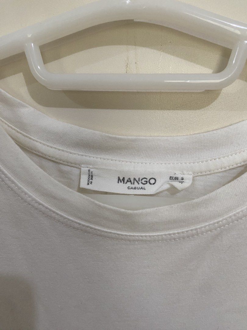 Mango White Graphic T-shirt (Category: Shirts) located in Taguig. Submitted by maly01_ (Listing ID 1461009634, Image 3). Description: dm for inquiries :).