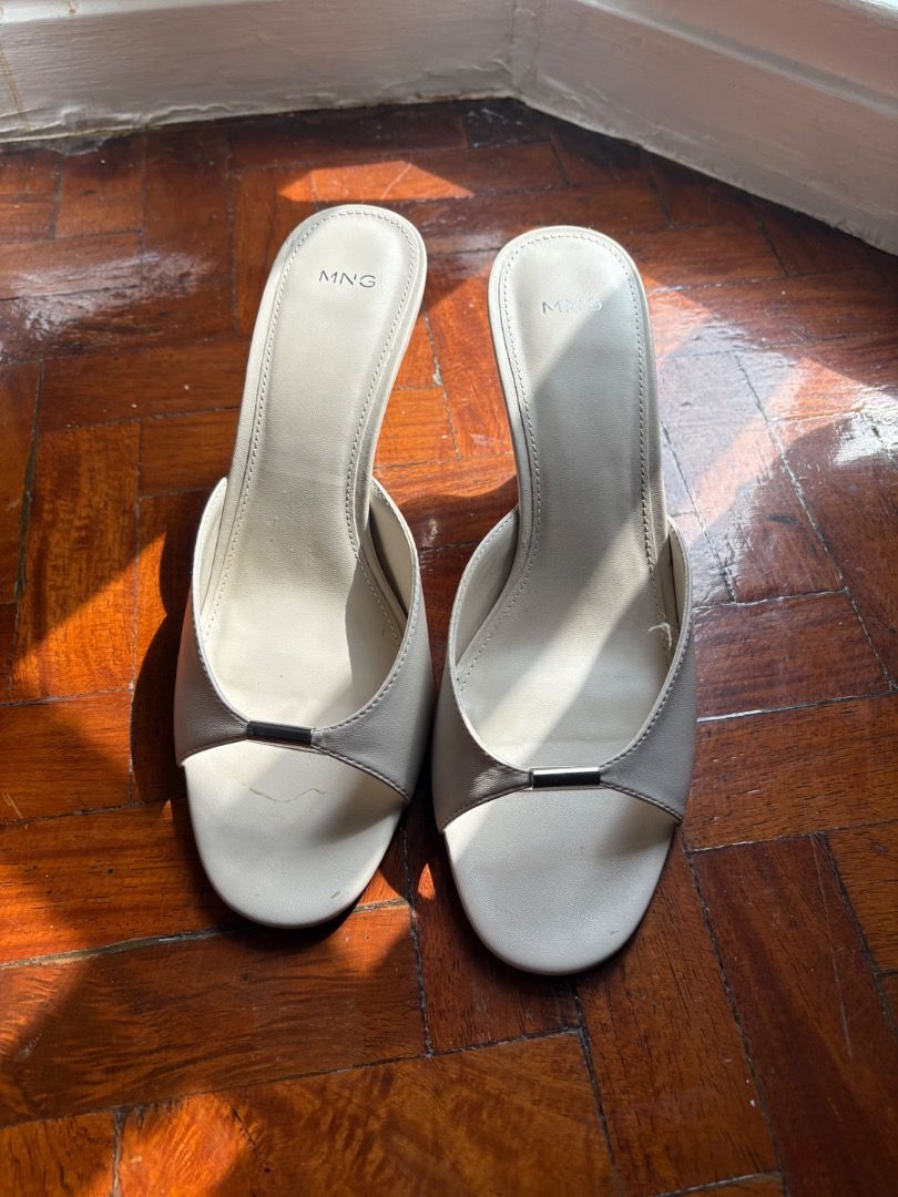Mango White Heels (Category: Heels) located in Quezon City. Submitted by icecreammonster (Listing ID 1460990659, Image 1). Description: Mango White Kitten Heels Size 8 Used once.