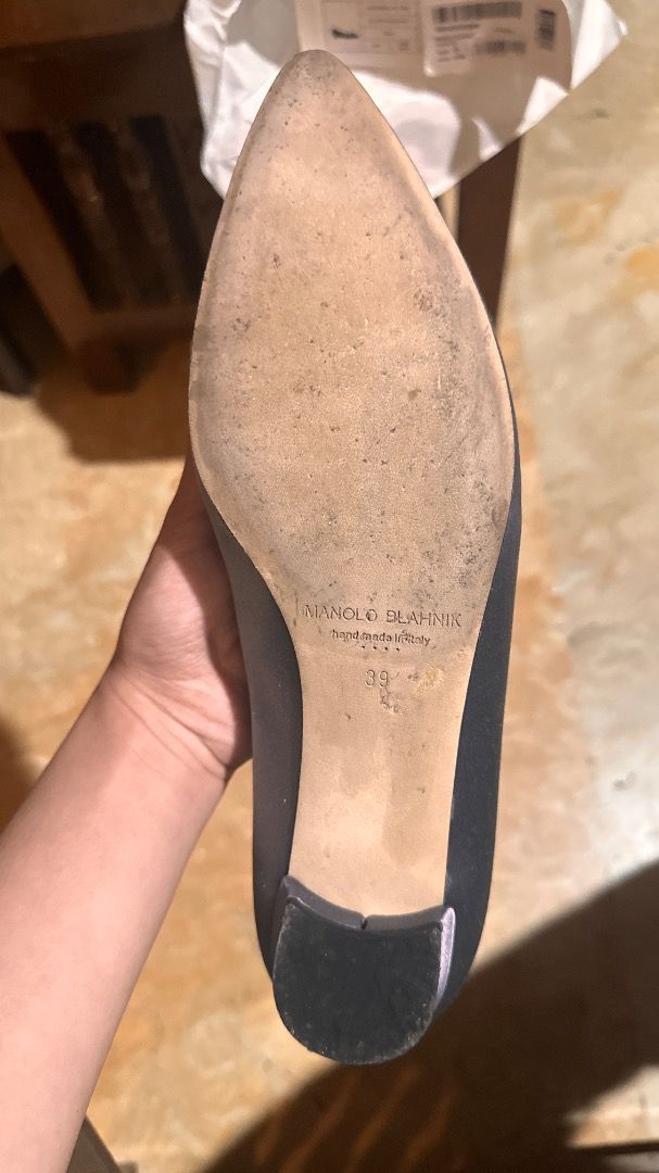 Manolo Blahnik Hangisi Flats Size 39 (Category: Flats & Sandals) located in Caloocan City. Submitted by kayechang23 (Listing ID 1461074011, Image 2). Description: - Authentic - Brand: Manolo Blahnik - Model: Hangisi Flats - Size: 39 - Color: Grey Satin - Slightly Negotiable - Embellishment: Crystal Buckle - Condition: Comes with original box - Origin: Handmade in Italy - Style: Beautiful and classic - Wore once for wedding.