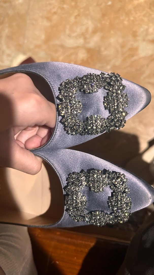 Manolo Blahnik Hangisi Flats Size 39 (Category: Flats & Sandals) located in Caloocan City. Submitted by kayechang23 (Listing ID 1461074011, Image 3). Description: - Authentic - Brand: Manolo Blahnik - Model: Hangisi Flats - Size: 39 - Color: Grey Satin - Slightly Negotiable - Embellishment: Crystal Buckle - Condition: Comes with original box - Origin: Handmade in Italy - Style: Beautiful and classic - Wore once for wedding.