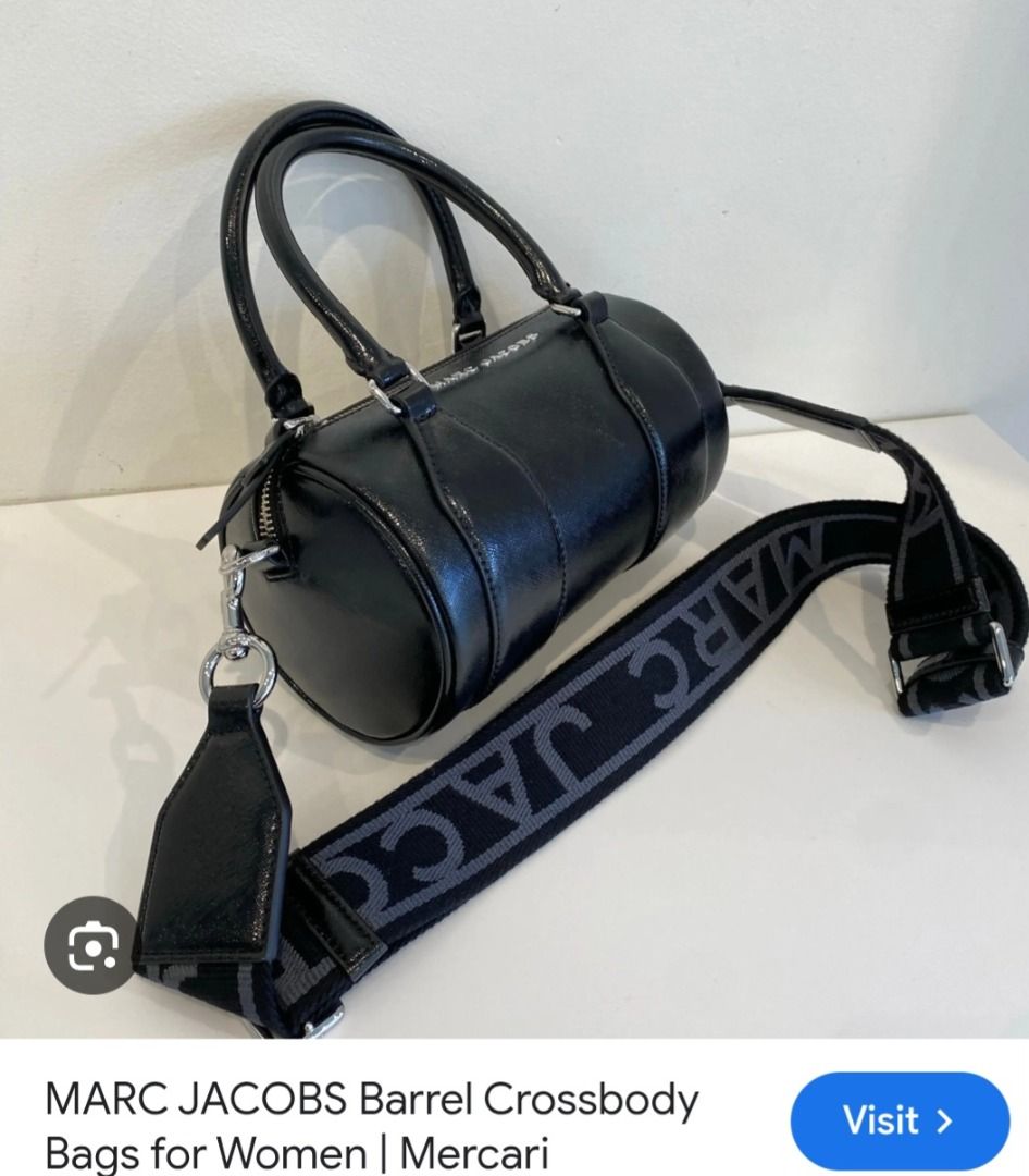 Marc Jacobs Barrel Crossbody Bag Black (Category: Luxury Bags & Wallets) located in Manila. Submitted by katkween23 (Listing ID 1460959128, Image 1). Description: Selling a Marc Jacobs barrel crossbody bag. Black shiny leather. Comes with a wide strap with "MARC JACOBS" logo. Also has top handles. Includes dust bag and tags. Never used..