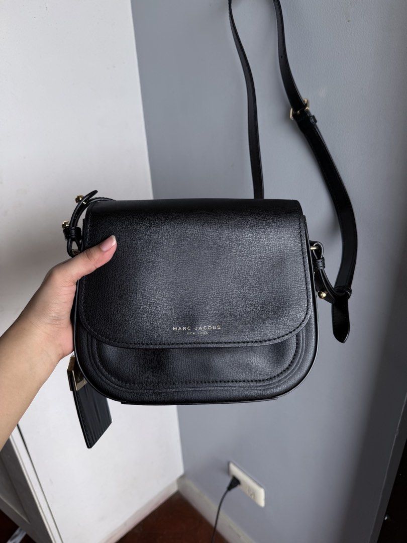 Marc Jacobs Black Leather Cross-body bag (Category: Cross-body Bags) located in Paranaque City. Submitted by jarediniiiee (Listing ID 1460997133, Image 1). Description: Bought from Japan.