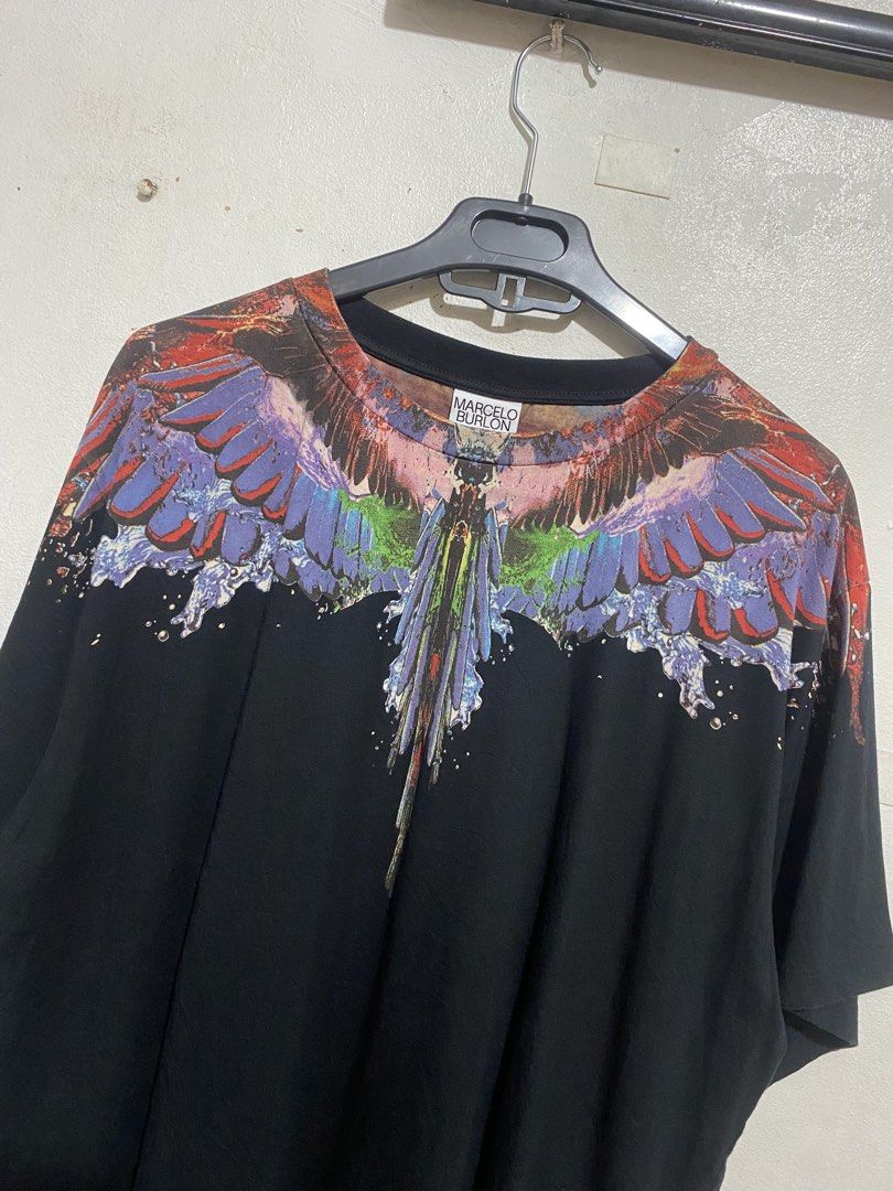 MARCELO BURLON AUTHENTIC BRANDNEW SHIRT (Category: Tshirts & Polo Shirts ) located in Caloocan City. Submitted by alexahvaldez (Listing ID 1461085976, Image 2). Description: NEGO FOR SURE BUYER 23 / 30 BRAND NEW CONDITION NO ISSUE.