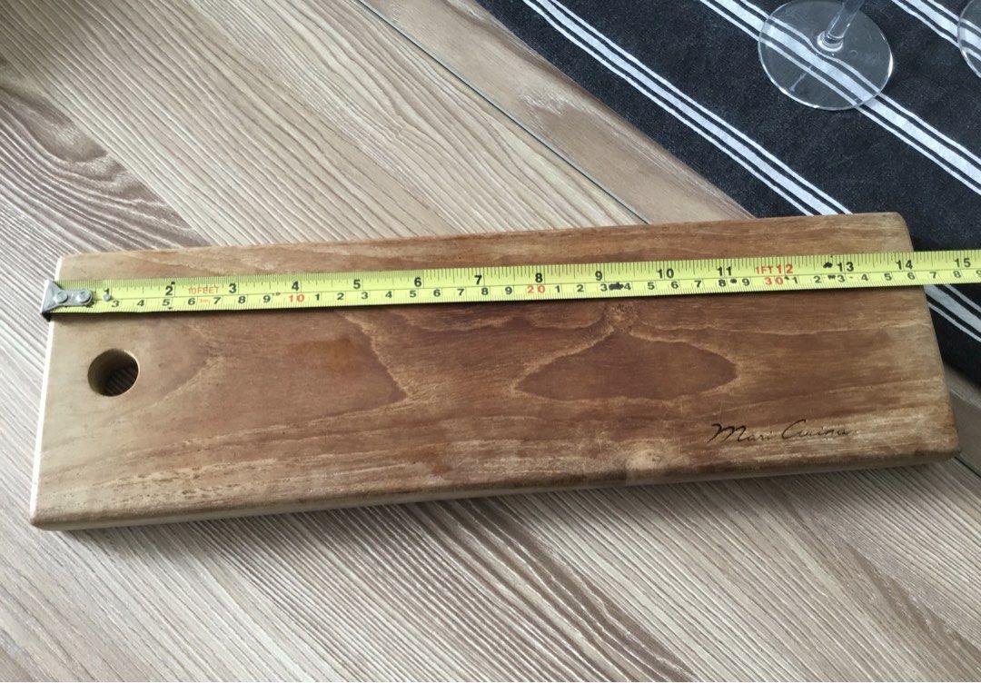Mari Cucina premium solid wood cheese board / bread board/ sushi board (Category: Knives & Chopping Boards) located in Manila. Submitted by declutteringpixie (Listing ID 1461073598, Image 1). Description: **ships from QC LIGHTLY used, in very good condition Premium quality solid wood board Can be used as chopping board as well Perfect for wine night :) *wine Glass set sold separately.