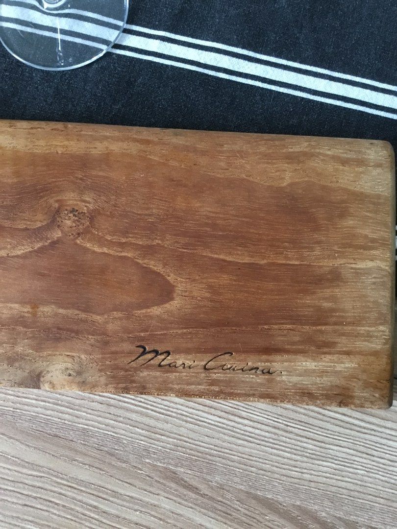 Mari Cucina premium solid wood cheese board / bread board/ sushi board (Category: Knives & Chopping Boards) located in Manila. Submitted by declutteringpixie (Listing ID 1461073598, Image 2). Description: **ships from QC LIGHTLY used, in very good condition Premium quality solid wood board Can be used as chopping board as well Perfect for wine night :) *wine Glass set sold separately.