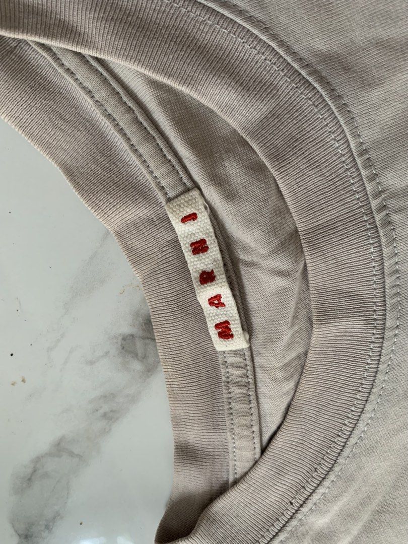 Marni Graphic T-shirt (Category: Tshirts & Polo Shirts ) located in Manila. Submitted by vntgjam (Listing ID 1460966111, Image 2). Description: Marni Graphic T-shirt W20 L26.5.