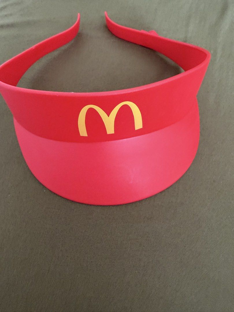 McDonald's Red Visor with Golden Arches Logo (Category: Everything Else Others) located in Manila. Submitted by tipanty2977 (Listing ID 1460948136, Image 2). Description: - Iconic red visor with golden arches logo - Perfect for sunny days - Fun accessory for McDonald's fans and collectors - One size fits most - Easy to wear and clean.