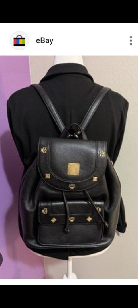 MCM Black Leather Backpack with Gold Studs (Category: Backpacks) located in Quezon City. Submitted by goshen24 (Listing ID 1460936349, Image 3). Description: - Authentic black leather MCM backpack - Iconic MCM logo and elegant gold stud details - Secure drawstring closure with a stylish flap top - Convenient front pocket with snap closure - Adjustable shoulder straps for a comfortable fit - Ideal for everyday adventures or your next getaway origi