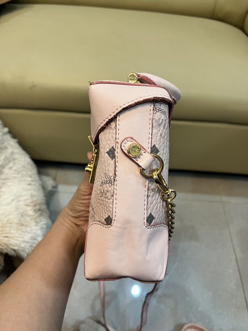 MCM mini bagpack-pink (Category: Luxury Bags & Wallets) located in Cebu City. Submitted by nbetcuban007trendyfinds (Listing ID 1460929553, Image 2). Description: Genuine MCM visetos MCM shoulder bag in good overall condition. Color: Pink. With issues in sling strap rubber lining Like new except the strap .