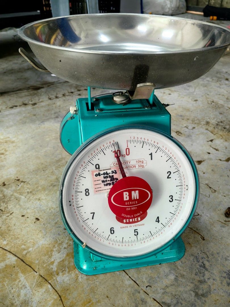 Mechanical Scale Two Dial (Category: Others) located in Kuala Lumpur. Submitted by warmbird_097f5e (Listing ID 1460955607, Image 3). Description: - Sturdy mechanical scale - Teal green body - Stainless steel weighing bowl - Double dial for easy reading - 10kg capacity - Suitable for kitchen or small business use.