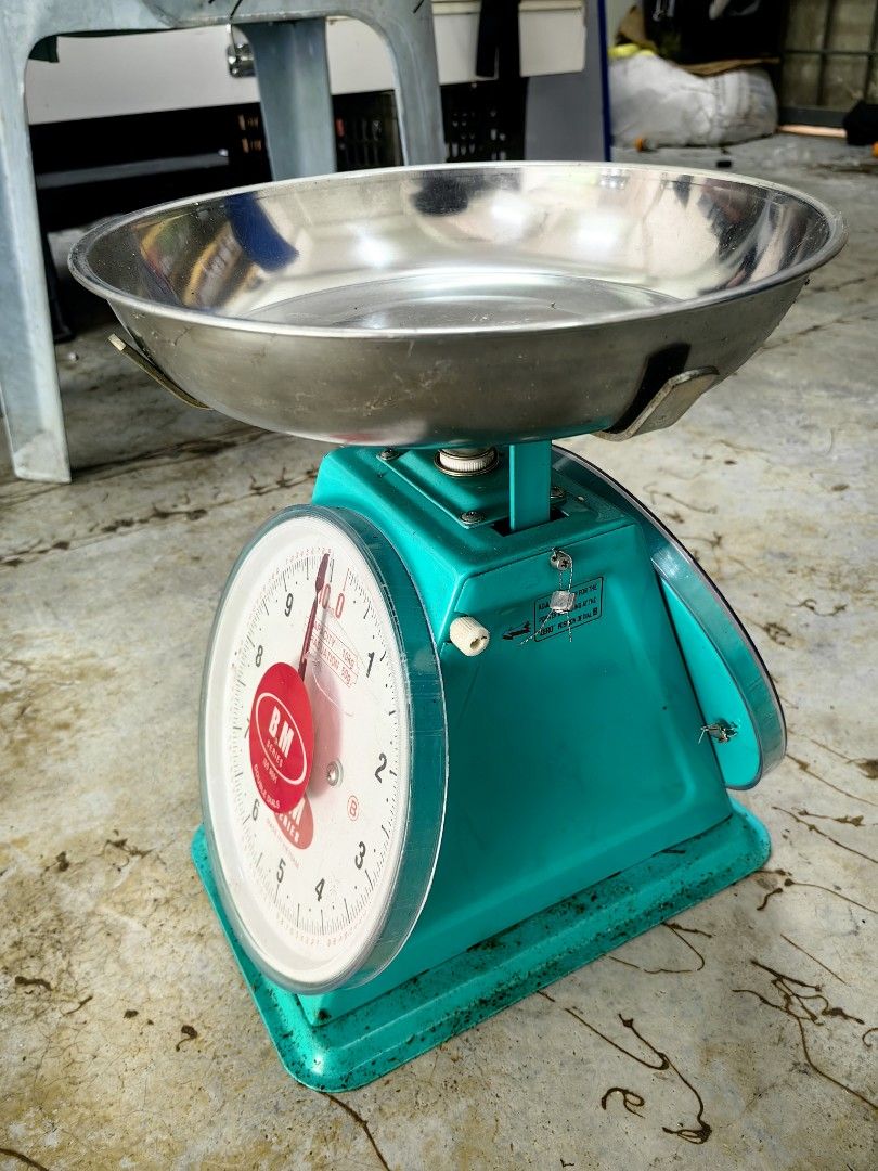 Mechanical Scale Two Dial (Category: Others) located in Kuala Lumpur. Submitted by warmbird_097f5e (Listing ID 1460955607, Image 1). Description: - Sturdy mechanical scale - Teal green body - Stainless steel weighing bowl - Double dial for easy reading - 10kg capacity - Suitable for kitchen or small business use.