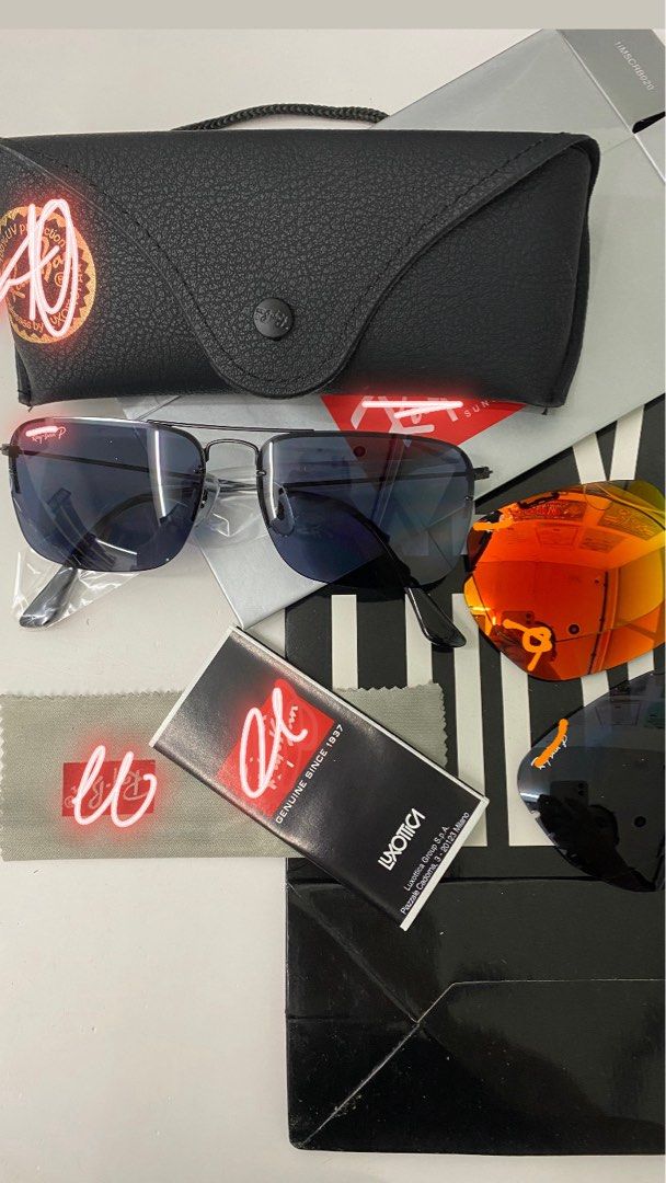 MEN / WOMEN SUNGLASSES (Category: Sunglasses & Eyewear) located in San Juan City. Submitted by wristcheckdiaries (Listing ID 1460957162, Image 3). Description: - Genuine Rb Aviator sunglasses - Includes 3 lens options: green, blue mirror, and orange mirror - Comes with original case and cleaning cloth - Easily switch lenses to match your style - Authentic Luxottica product.