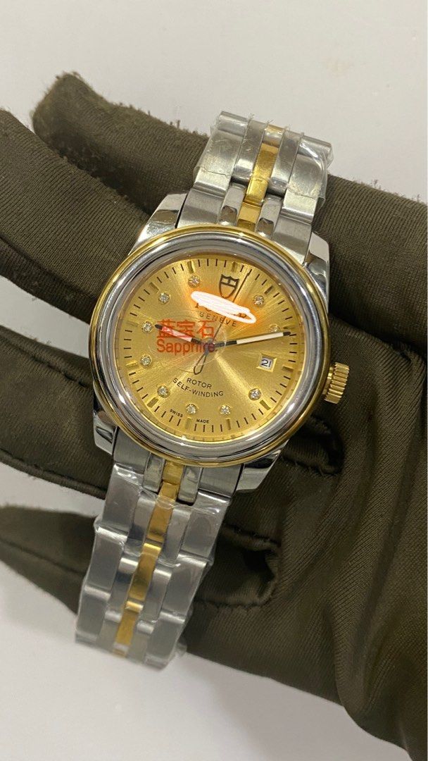 Men watches (Category: Luxury Watches) located in San Juan City. Submitted by wristcheckdiaries (Listing ID 1460970061, Image 2). Description: - Three Geneve Rotor Self-Winding Watches - Two models with Gold Dials, Diamond Markers, and Gold Bracelet Accents - One model with Silver Dial and Gold Bracelet Accents - All feature durable Sapphire Crystal - Authentic Swiss Made quality - Ideal for watch collectors or daily luxury wear.