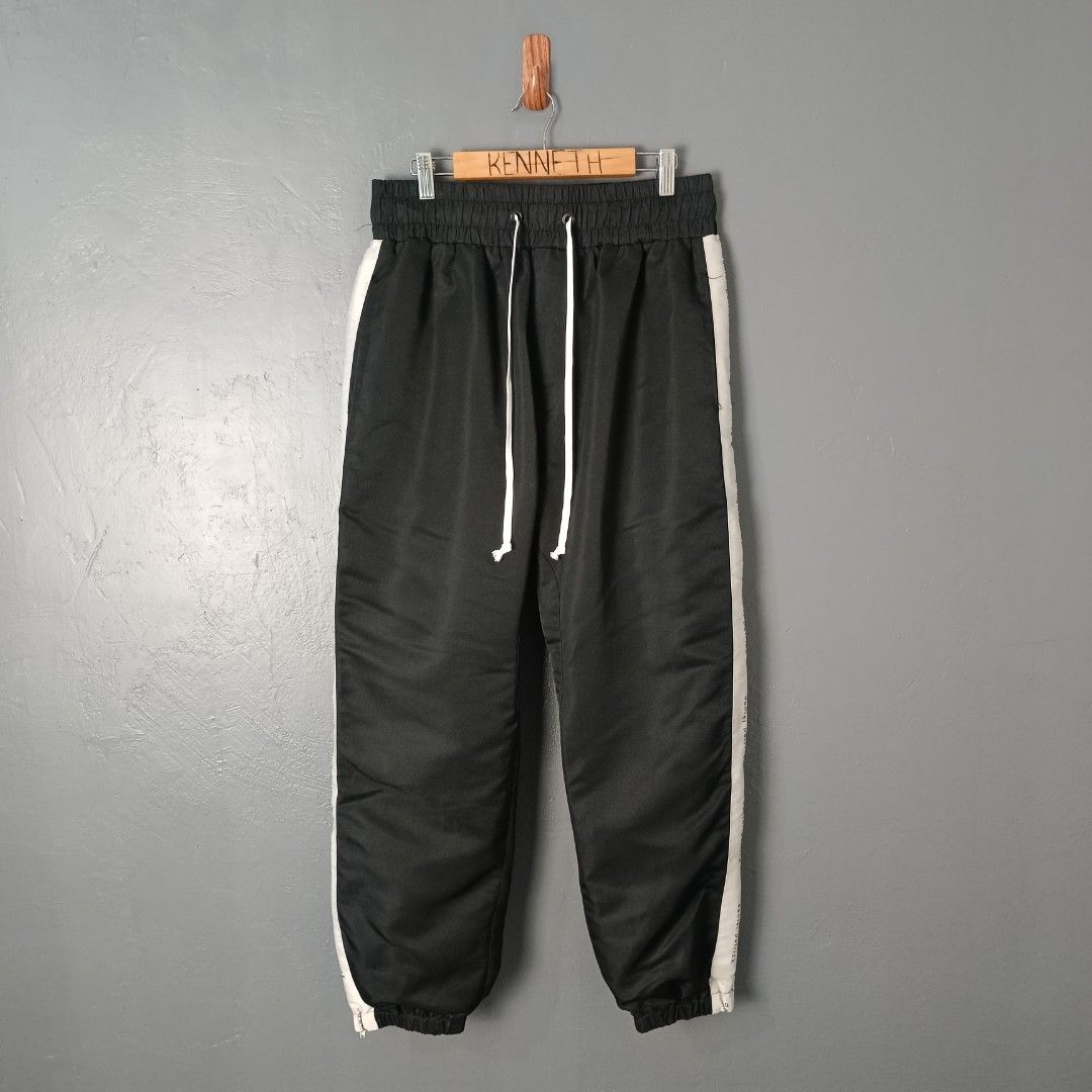 Men's - Daniel Patrick - Parachute Pants (Category: Joggers) located in Bacolod City. Submitted by drop.ph (Listing ID 1460998657, Image 2). Description: Daniel Patrick - Parachute Track Pants Authentic *Ankle Zipped *Fits 30-32, Length - 37.5 *Excellent *No Flaws *Price: 1,200php *Add SF if outside Bacolod City.