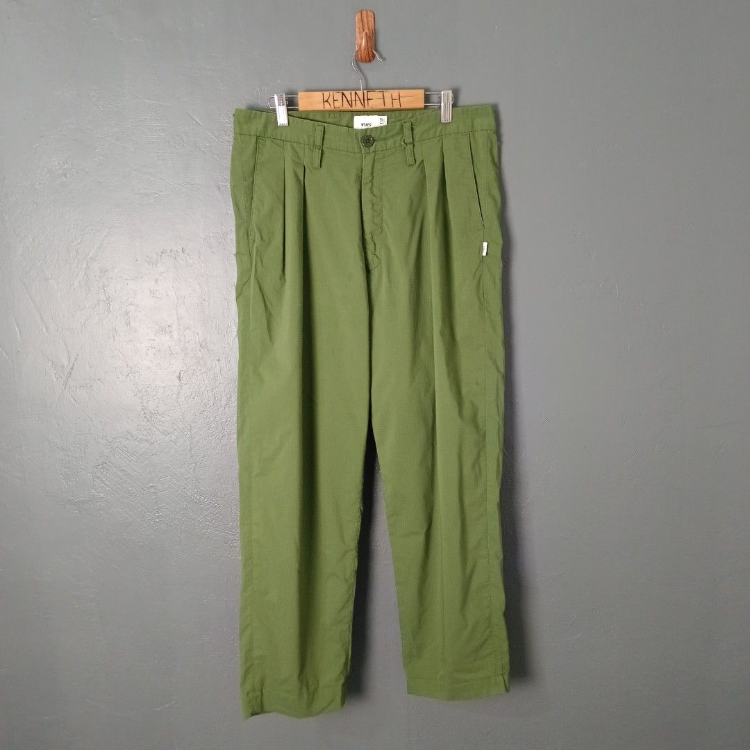 Men's - WTAPS (Category: Trousers) located in Bacolod City. Submitted by drop.ph (Listing ID 1461084491, Image 2). Description: WTAPS - Ripstop Tuck Trousers Authentic *Fits 32 (Actual Tape) Length - 38.5, Leg Opening - 7.5 *Excellent *No Flaws *Price: 1,800php *Add SF if outside Bacolod City .