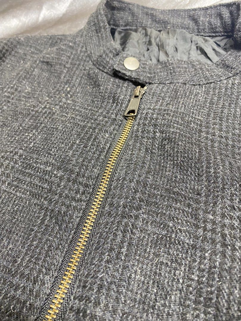 Men's Plaid Bomber Jacket (Category: Coats, Jackets and Outerwear) located in Manila. Submitted by kevinthriftshop (Listing ID 1461064964, Image 2). Description: - Stylish grey plaid bomber jacket - Full zip-up front with a secure snap button collar - Comfortable ribbed cuffs and hem for a snug fit - Feels like a warm wool blend, ideal for cooler weather - Versatile piece for everyday casual wear Location: Cavite.