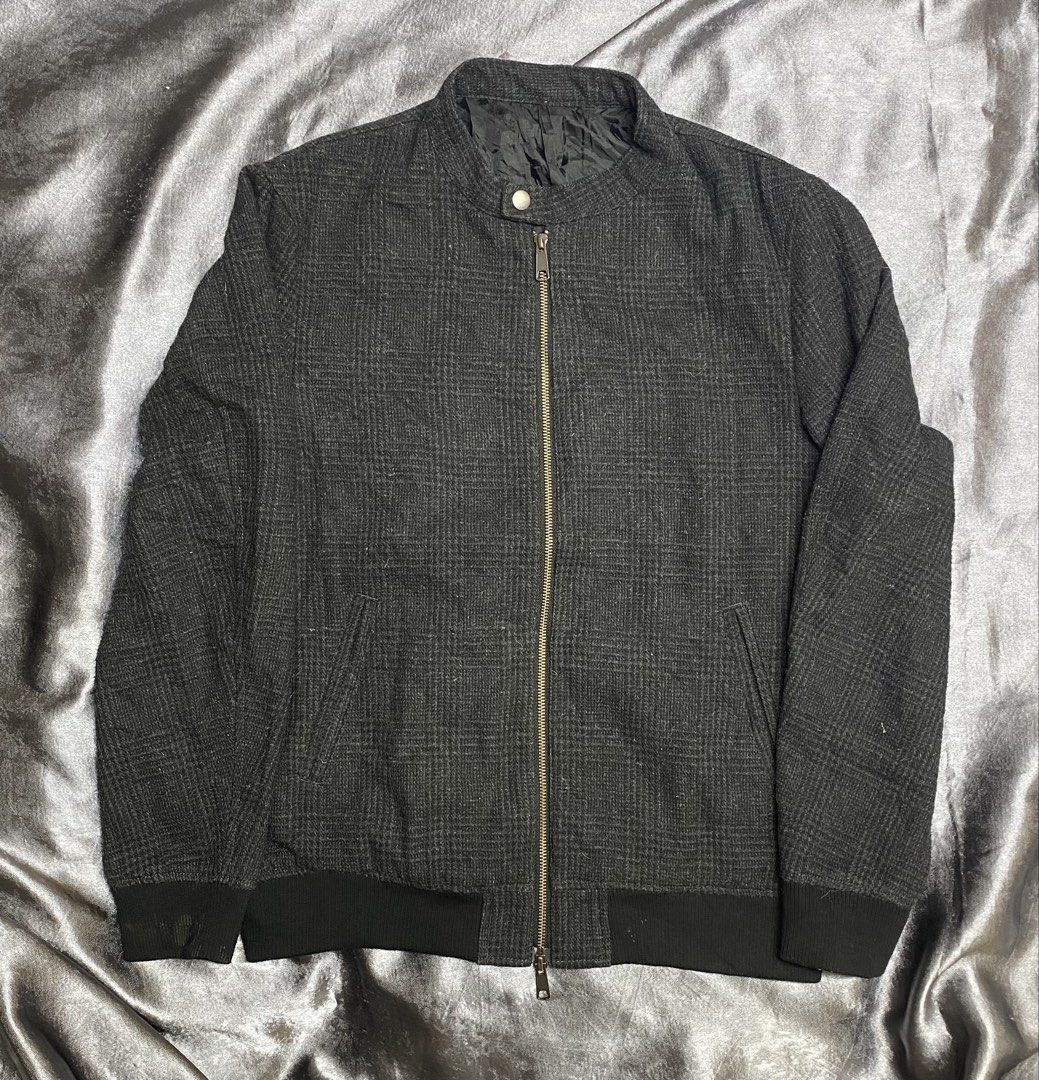 Men's Plaid Bomber Jacket (Category: Coats, Jackets and Outerwear) located in Manila. Submitted by kevinthriftshop (Listing ID 1461064964, Image 1). Description: - Stylish grey plaid bomber jacket - Full zip-up front with a secure snap button collar - Comfortable ribbed cuffs and hem for a snug fit - Feels like a warm wool blend, ideal for cooler weather - Versatile piece for everyday casual wear Location: Cavite.