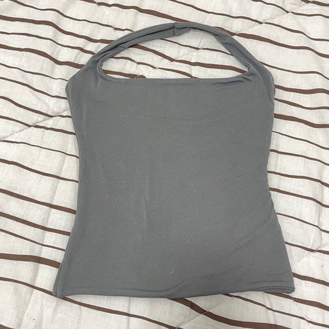 MERA Backless Halter Top (Category: Sleeveless) located in Manila. Submitted by ukhy_shop (Listing ID 1461089582, Image 1). Description: - Basic Dark Gray Top - Halter Style - Stretchy/Cotton Material - Great fit: S 🛒— ₱90 ONLY dm to avail ‼️.