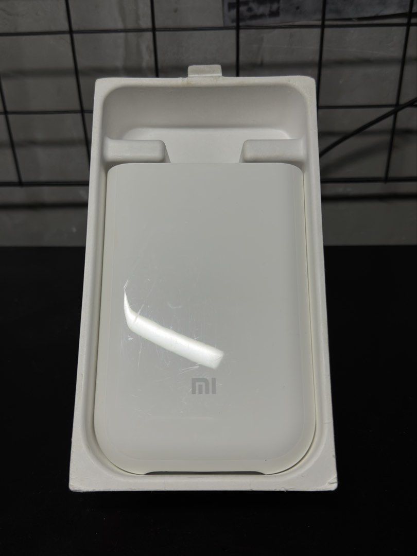 Mi Portable Photo Printer (Category: Printers, Scanners & Copiers) located in Manila. Submitted by markjandell (Listing ID 1461050269, Image 3). Description: Mi Portable Photo Printer • Print Tech: Thermal Zink ( Zero Ink ) • Printing Resolution: 313 x 400 • Photo Size: 2 x 3 in / 50 x 76 mm • Connectivity: Bluetooth 5.0 • Battery: 500mAh ( Can print up to 20 photos ) • App Compatibility: Xiaomi Home App Condition: 8/10 with sticker residues and 