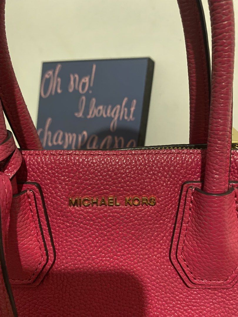Michael Kors Mercer Medium Pebbled Leather (Category: Cross-body Bags) located in Rizal. Submitted by wild.lastly (Listing ID 1461006589, Image 3). Description: No issue, just normal signs of use sa may puller, sobrang minimal, hindi nakakabawas sa ganda nung bag - Ultra Pink color or Deep Fuchsia, Hot Pink - Medium size with sling - hardware’s is super good, since maarte ako haha LAST PRICE POSTED.