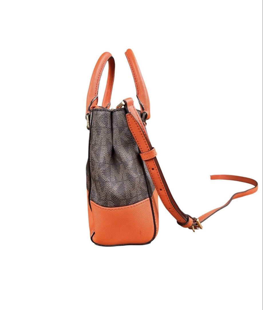Michael Kors Monogram Canvas Leather Satchel Orange (Category: Cross-body Bags) located in Tuguegarao City. Submitted by closet_jz (Listing ID 1460941478, Image 2). Description: - Authentic Michael Kors satchel bag - Signature MK monogram canvas - Stylish orange leather trim - Comfortable top handles - Detachable shoulder strap for versatility - Secure zipper closure - Interior pockets for organization - Ideal size for everyday essentials - Clean