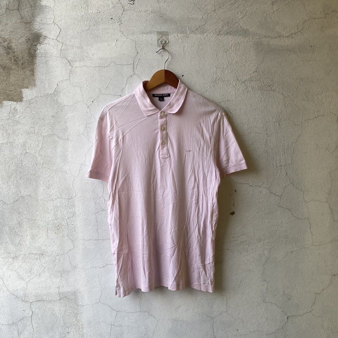 Michael Kors Pink Short-Sleeve Polo (Category: Tshirts & Polo Shirts ) located in Cebu City. Submitted by laughthrift.ph (Listing ID 1461008013, Image 1). Description: * XS on tag, best fit to S * (27) L x (20) W * Excellent condition * 9/10 Color rate * No issues ₱750 + shipping fee.