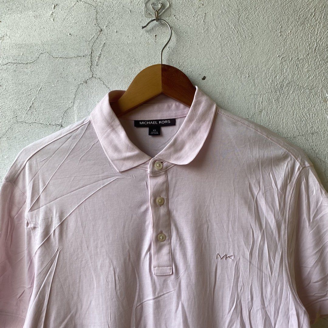 Michael Kors Pink Short-Sleeve Polo (Category: Tshirts & Polo Shirts ) located in Cebu City. Submitted by laughthrift.ph (Listing ID 1461008013, Image 2). Description: * XS on tag, best fit to S * (27) L x (20) W * Excellent condition * 9/10 Color rate * No issues ₱750 + shipping fee.