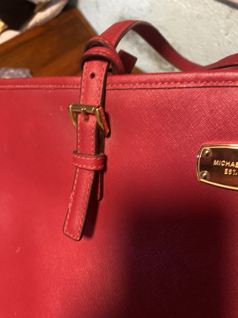 Michael Kors Tote Bag vibrant Red (Category: Tote Bags) located in Cabanatuan. Submitted by prelovedbycheesekeyk (Listing ID 1460948555, Image 3). Description: 600 nlng No major Flaws Ganda pa Large size Made in Philippines og.