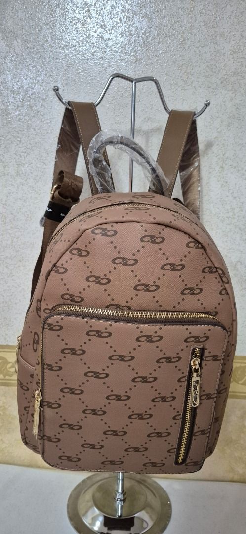 MID21-550 Kari Brown Monogram Backpack (Category: Backpacks) located in Valenzuela. Submitted by dailyhappyfinds (Listing ID 1460936563, Image 2). Description: BRAND: Kari -Brand new with tag -Backpack -Please check last photo for details .