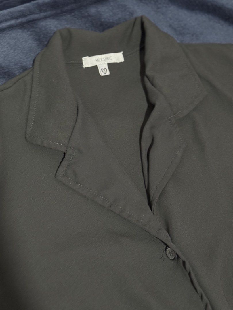 Milkshake Black Button-Up Collared Short Sleeve Romper (Category: Rompers) located in Batangas. Submitted by cathevans (Listing ID 1460979826, Image 3). Description: - Stylish black romper - Collared neckline and short sleeves - Comfortable elasticated waist - Functional button-up front - Versatile for casual outings - Easy to pair with sneakers or sandals.