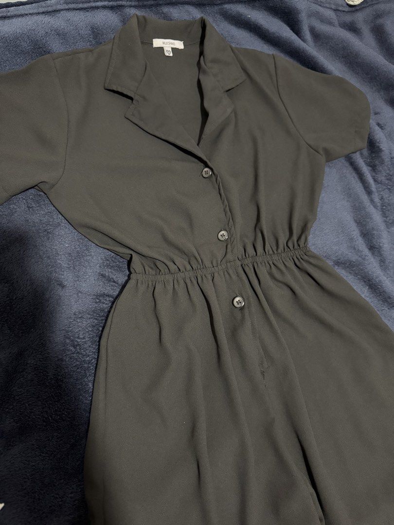 Milkshake Black Button-Up Collared Short Sleeve Romper (Category: Rompers) located in Batangas. Submitted by cathevans (Listing ID 1460979826, Image 2). Description: - Stylish black romper - Collared neckline and short sleeves - Comfortable elasticated waist - Functional button-up front - Versatile for casual outings - Easy to pair with sneakers or sandals.