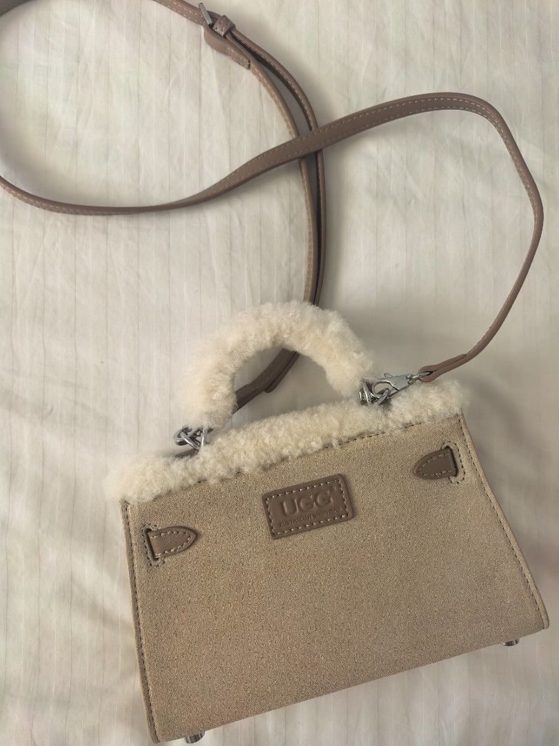 Mini Kelly by UGG Authentic (Category: Luxury Bags & Wallets) located in Quezon City. Submitted by quiltz (Listing ID 1460980780, Image 2). Description: UGG Australia Authentic Over Shoulder Bag Two Colors Available Sand (lighter) Chestnut (darker, tan) Fluffy Wool Top Beautiful thick Ugg Leather Mini Kelly look Hermes Not chanel gucci lv fendi flap classic tote prada miu designer ysl cd dior vuitton fashion statement Meet Up West Ave QC Makati.