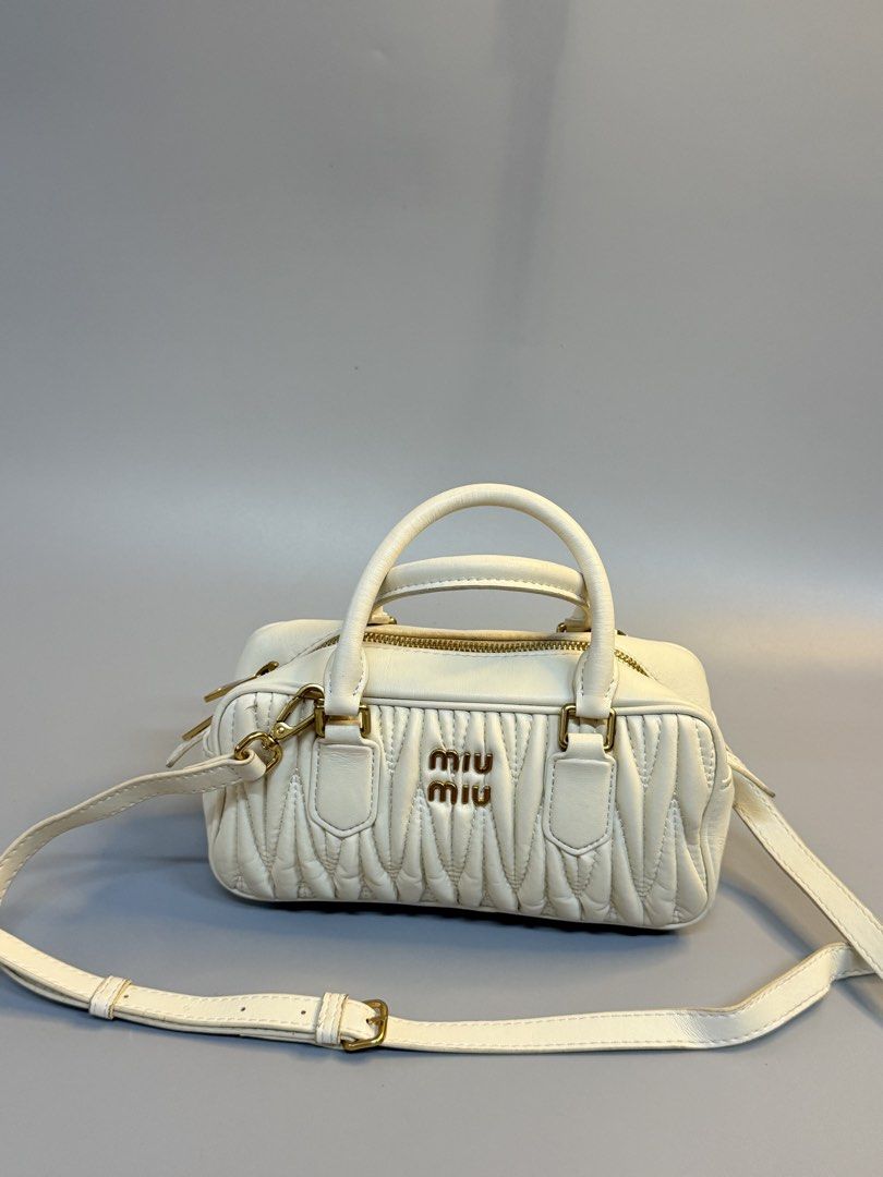 Miu Miu (Category: Cross-body Bags) located in Cebu City. Submitted by ricahsukaybags_2017 (Listing ID 1460958906, Image 1). Description: Miu miu sling or handbag. Sign of used missing lng isa paa sa ilalim di naman po yan kita. Can fit promax and longwallet.