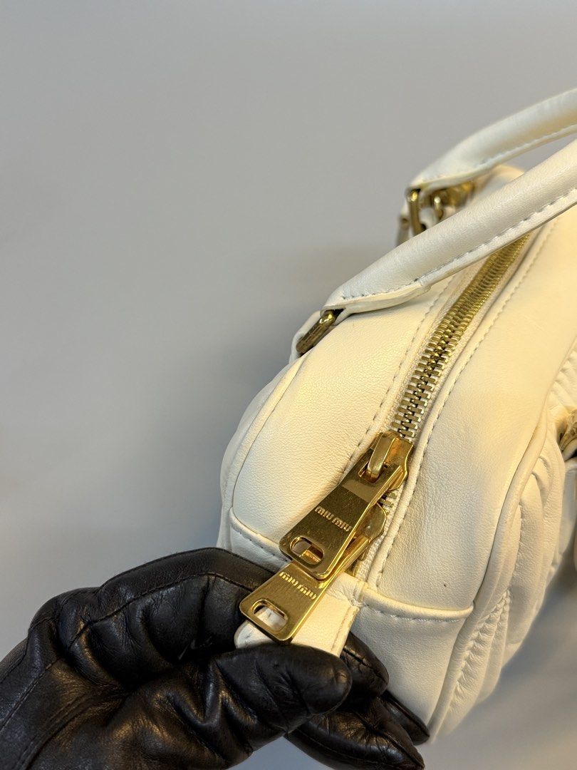 Miu Miu (Category: Cross-body Bags) located in Cebu City. Submitted by ricahsukaybags_2017 (Listing ID 1460958906, Image 3). Description: Miu miu sling or handbag. Sign of used missing lng isa paa sa ilalim di naman po yan kita. Can fit promax and longwallet.
