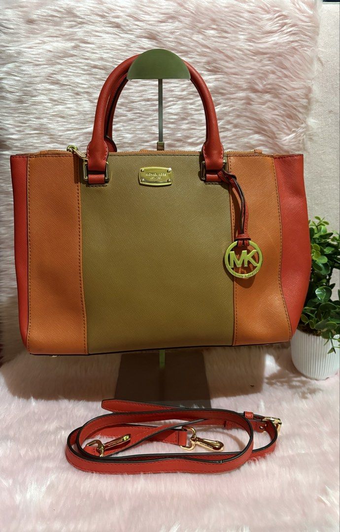 MK 2-way office bag (Category: Cross-body Bags) located in Tuguegarao City. Submitted by closet_jz (Listing ID 1460922871, Image 1). Description: Excellent condition no flaws.