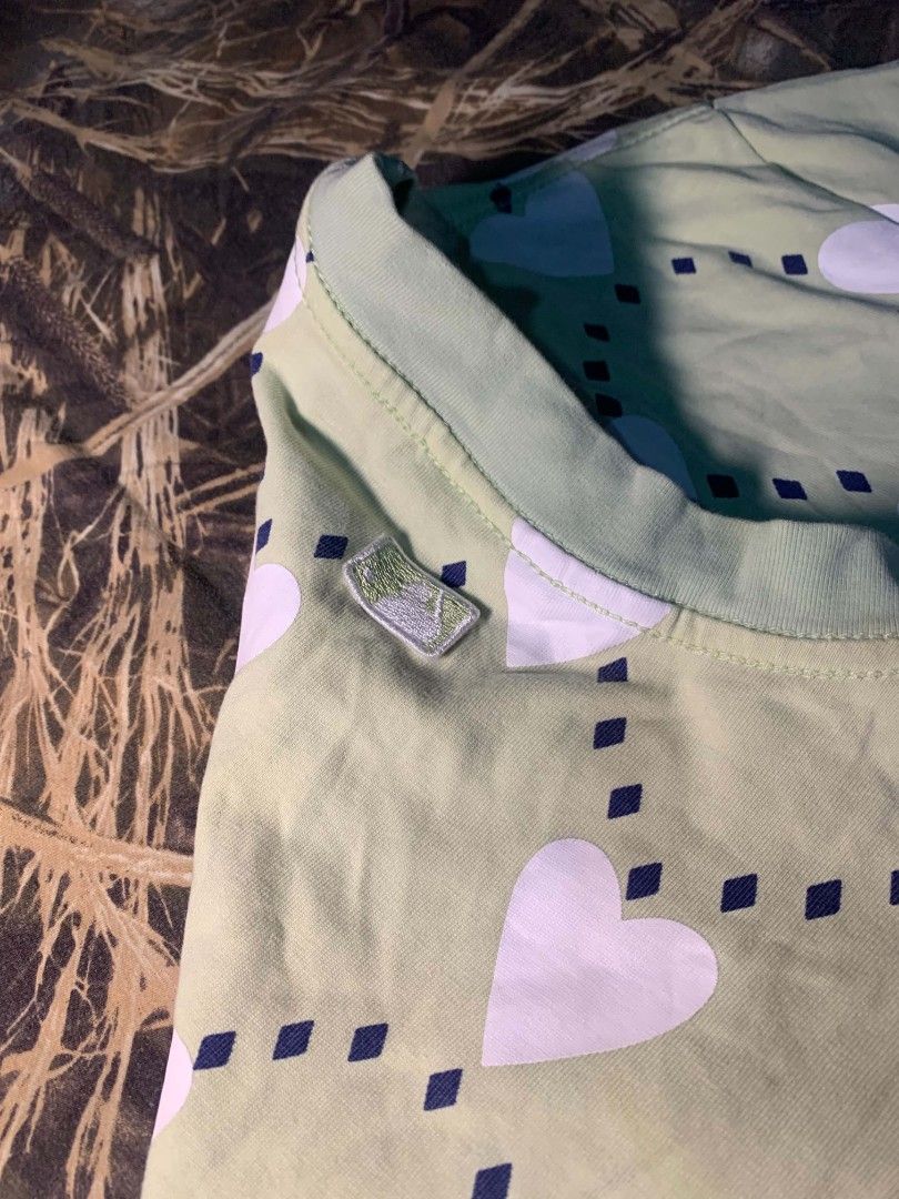 Mlb Heart Aop Shirt (Category: Tshirts & Polo Shirts ) located in Dipolog. Submitted by ethrifttt (Listing ID 1461089387, Image 3). Description: Mlb Heart Aop Shirt 21 width x 27 length excellent condition, minimal hairlines on 1 heart print only (not noticeable).