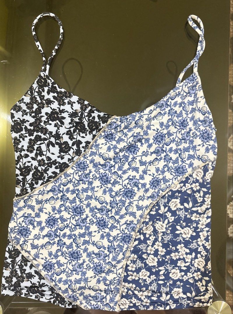 MNG Floral Patchwork Midi Dress (Category: Dresses) located in Muntinlupa City. Submitted by shopeverything_goes (Listing ID 1461093705, Image 3). Description: - MNG midi dress - Patchwork floral print (blue, white, black) - Asymmetrical hemline - Spaghetti straps - Ideal for casual wear or summer events - Comfortable and stylish design.