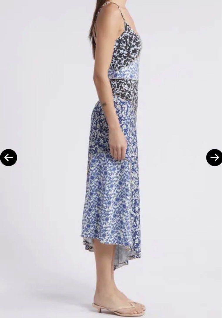 MNG Floral Patchwork Midi Dress (Category: Dresses) located in Muntinlupa City. Submitted by shopeverything_goes (Listing ID 1461093705, Image 2). Description: - MNG midi dress - Patchwork floral print (blue, white, black) - Asymmetrical hemline - Spaghetti straps - Ideal for casual wear or summer events - Comfortable and stylish design.