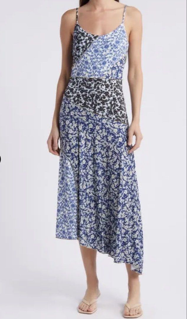 MNG Floral Patchwork Midi Dress (Category: Dresses) located in Muntinlupa City. Submitted by shopeverything_goes (Listing ID 1461093705, Image 1). Description: - MNG midi dress - Patchwork floral print (blue, white, black) - Asymmetrical hemline - Spaghetti straps - Ideal for casual wear or summer events - Comfortable and stylish design.