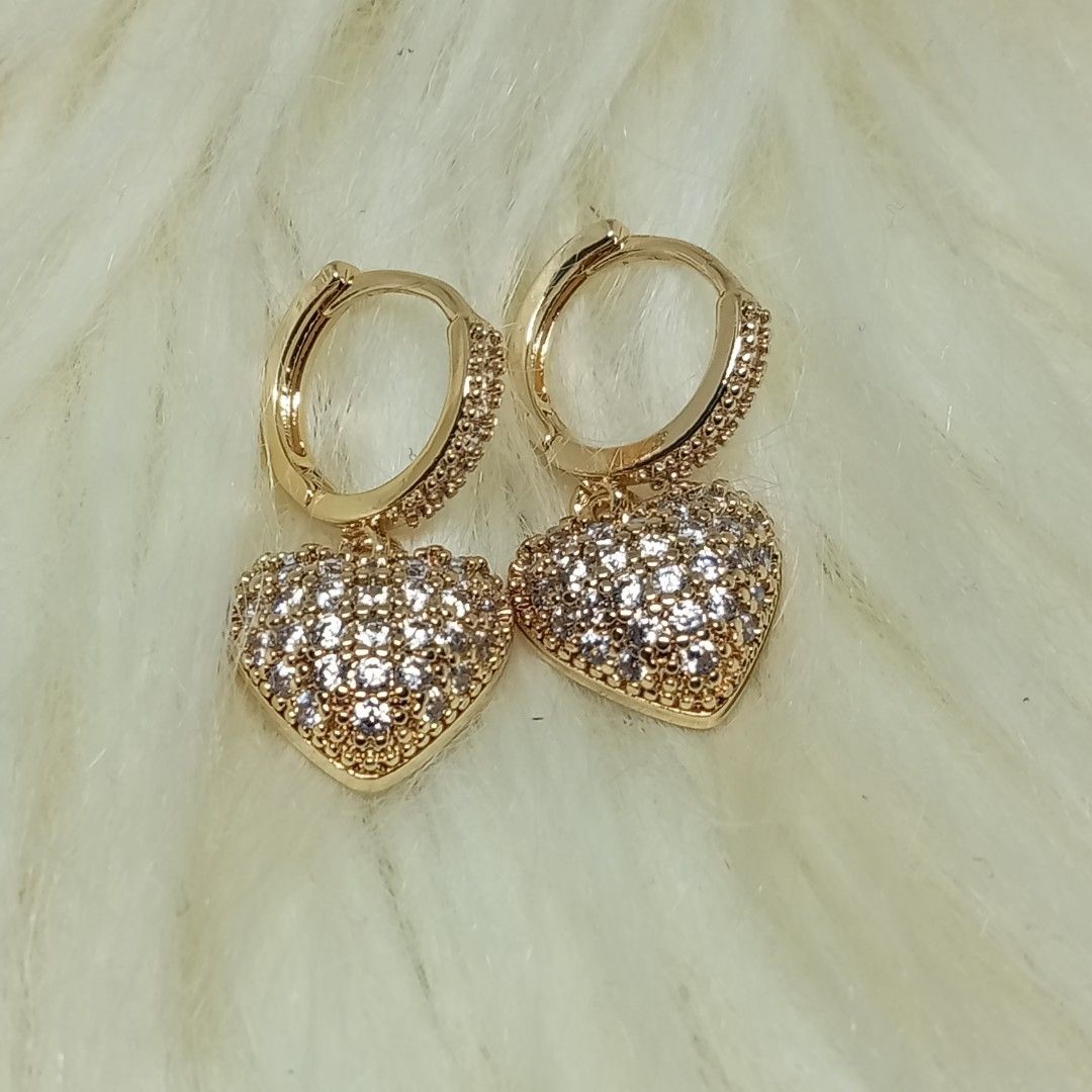Moissanite Heart Loop Earrings ✨ 18K goldplated (Category: Earrings) located in Ozamiz City. Submitted by leovelle. (Listing ID 1461043662, Image 1). Description: Moissanite Heart Loop Earrings ✨ 18K goldplated.