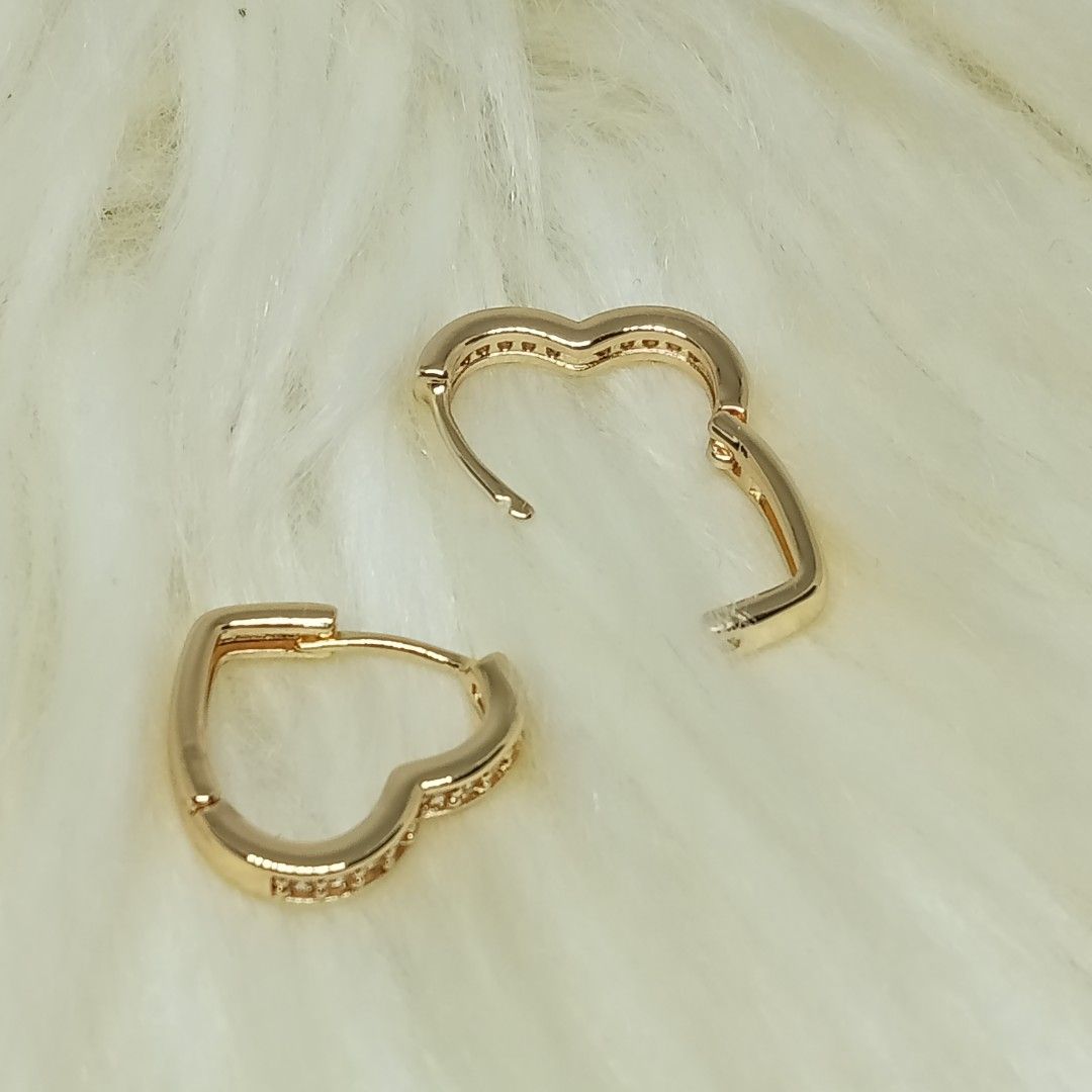 Moissanite Heart Loop Earrings ✨ 18K goldplated (Category: Earrings) located in Ozamiz City. Submitted by leovelle. (Listing ID 1461044229, Image 3). Description: Moissanite Heart Loop Earrings ✨ 18K goldplated.