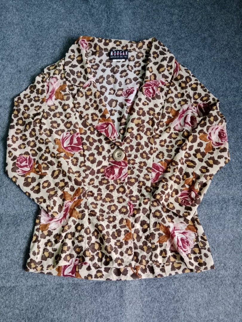Morgan de Toi Leopard Rose (Category: Coats, Jackets and Outerwear) located in Alburquerque. Submitted by romnickhatosa (Listing ID 1460991071, Image 1). Description: - Brand: Morgan de Toi - Design: Bold leopard and rose print - Closure: Single button at the front - Material: 100% Polyester - Style: Statement piece, perfect for dressing up outfits.