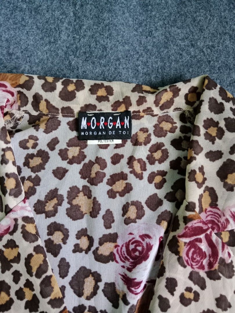 Morgan de Toi Leopard Rose (Category: Coats, Jackets and Outerwear) located in Alburquerque. Submitted by romnickhatosa (Listing ID 1460991071, Image 2). Description: - Brand: Morgan de Toi - Design: Bold leopard and rose print - Closure: Single button at the front - Material: 100% Polyester - Style: Statement piece, perfect for dressing up outfits.