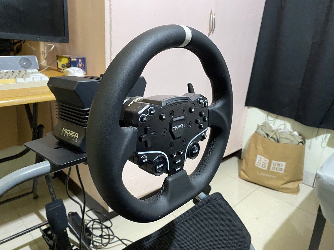 Moza R5 Bundle (Category: Controllers) located in Manila. Submitted by vincentzeo (Listing ID 1461095381, Image 3). Description: FOR SALE: MOZA R5 Racing Bundle with Playseat Selling my MOZA R5 Direct Drive Sim Racing Setup, complete with a Playseat racing cockpit. Great plug-and-play setup for anyone looking to get into sim racing Package includes: * MOZA R5 Direct Drive Wheel Base — 5.5 Nm torque * MOZA ES Steering Wheel with paddle shifters * 