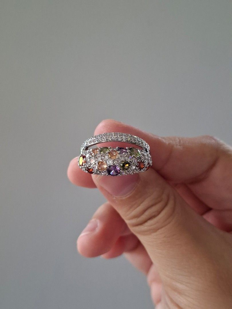 Multicolor Zirconia Stones Solver Ring Size 8 (Category: Rings) located in Dasmarinas. Submitted by danabrie22 (Listing ID 1460992840, Image 1). Description: size 8 very well-made, excellent crafstmanship 10/10 condition brand new stainless steel & cubic zirconia stones.