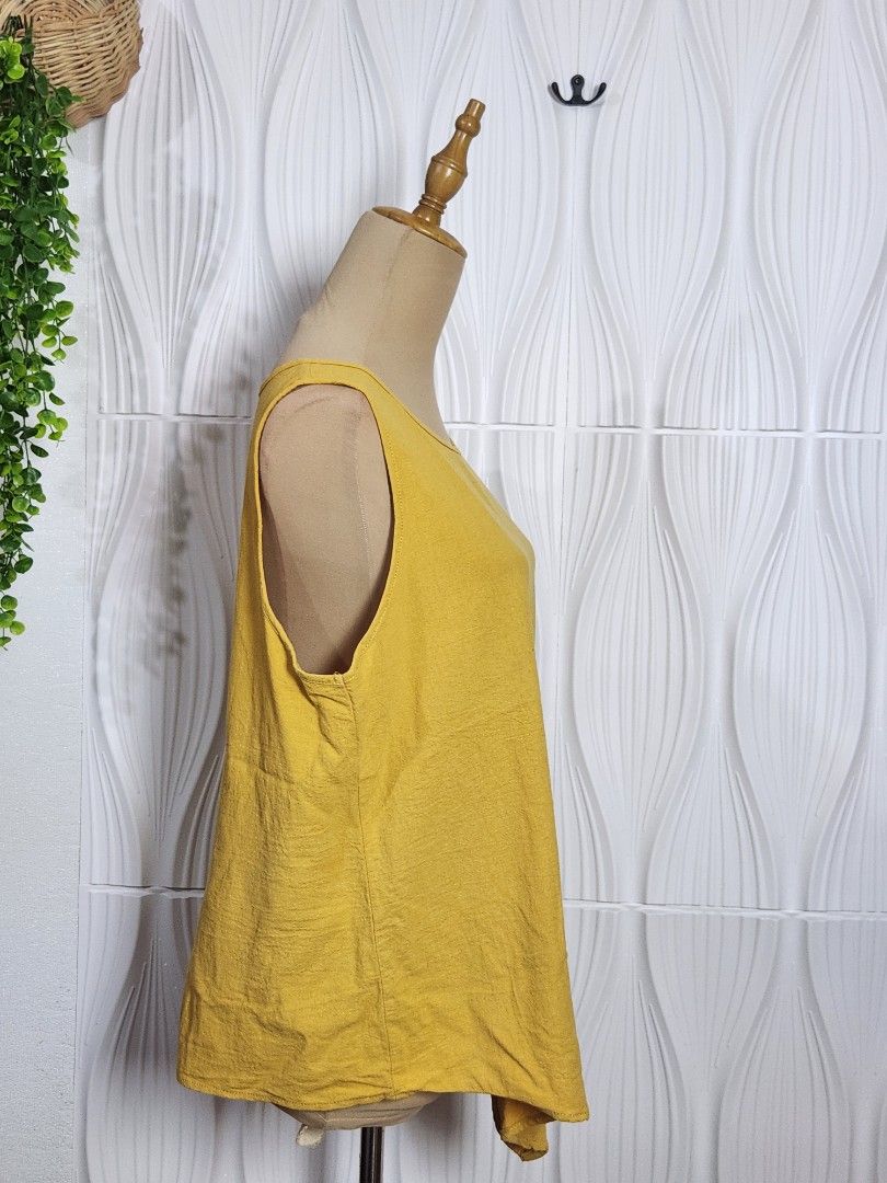 Mustard Sleeveless Blouse XL (Category: Blouses) located in Marikina City. Submitted by KanamiFinds (Listing ID 1461077380, Image 2). Description: Bust: 44 inches Length: 23 to 24 inches from shoulders.