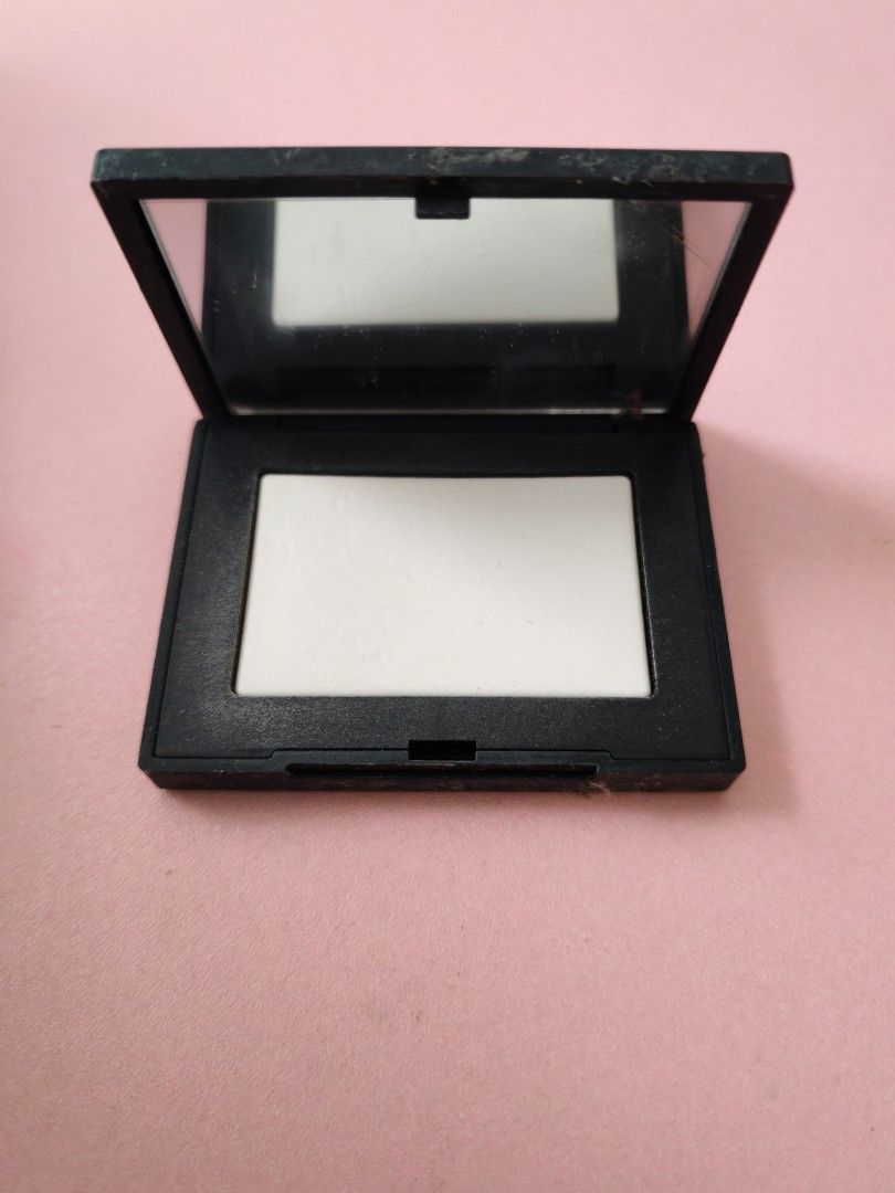 NARS LIGHT REFLECTING PRESSED POWDER (Category: Makeup) located in Manila. Submitted by itsmejorgy14 (Listing ID 1461001685, Image 1). Description: decluttering.