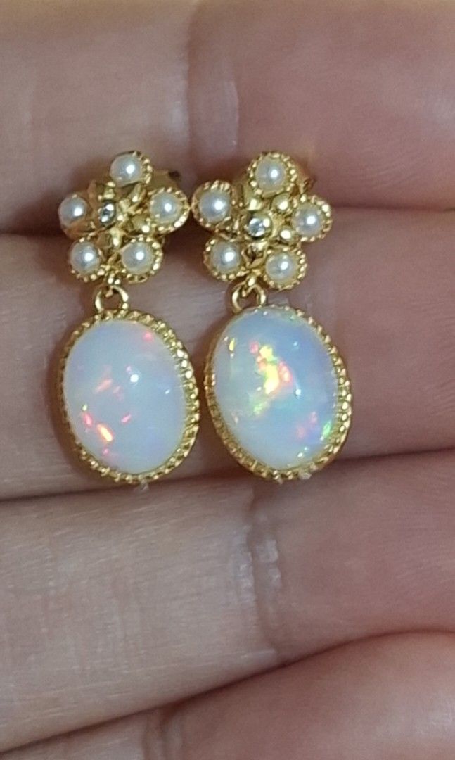 Natural Opal Earrings (Category: Earrings) located in Baguio. Submitted by marinel.caranto (Listing ID 1461006881, Image 1). Description: natural opal (8x10mm) beautiful play of color strong flash s925 gold plated silver 3000.00 only.