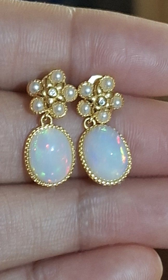 Natural Opal Earrings (Category: Earrings) located in Baguio. Submitted by marinel.caranto (Listing ID 1461006881, Image 2). Description: natural opal (8x10mm) beautiful play of color strong flash s925 gold plated silver 3000.00 only.